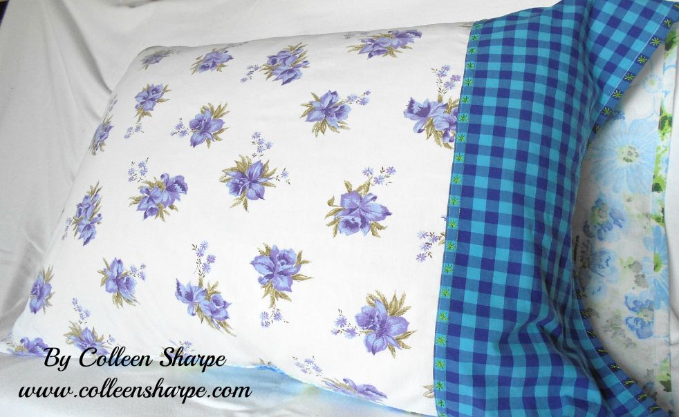 purple and blue floral embroidered pillowcase from vintage sheets