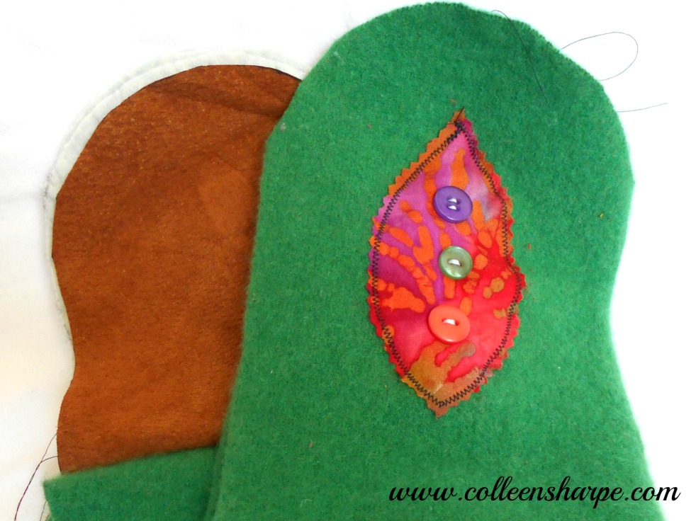 green cashmere wool mitten with brown leather palm and boho embellishment